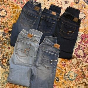 FIVE pairs of American Eagle Jeans